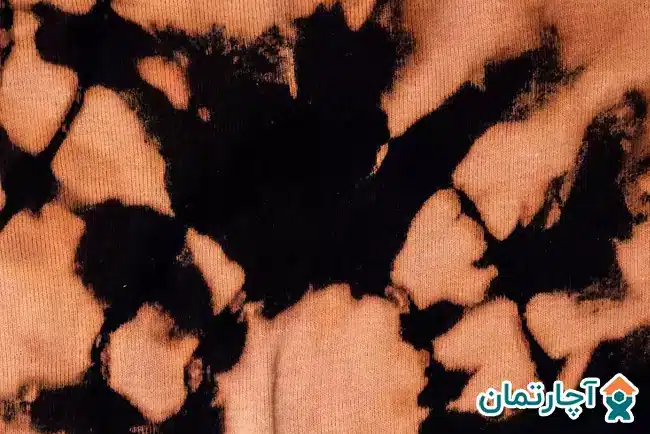 ترمیم لکه سفید کننده از روی لباس مشکی